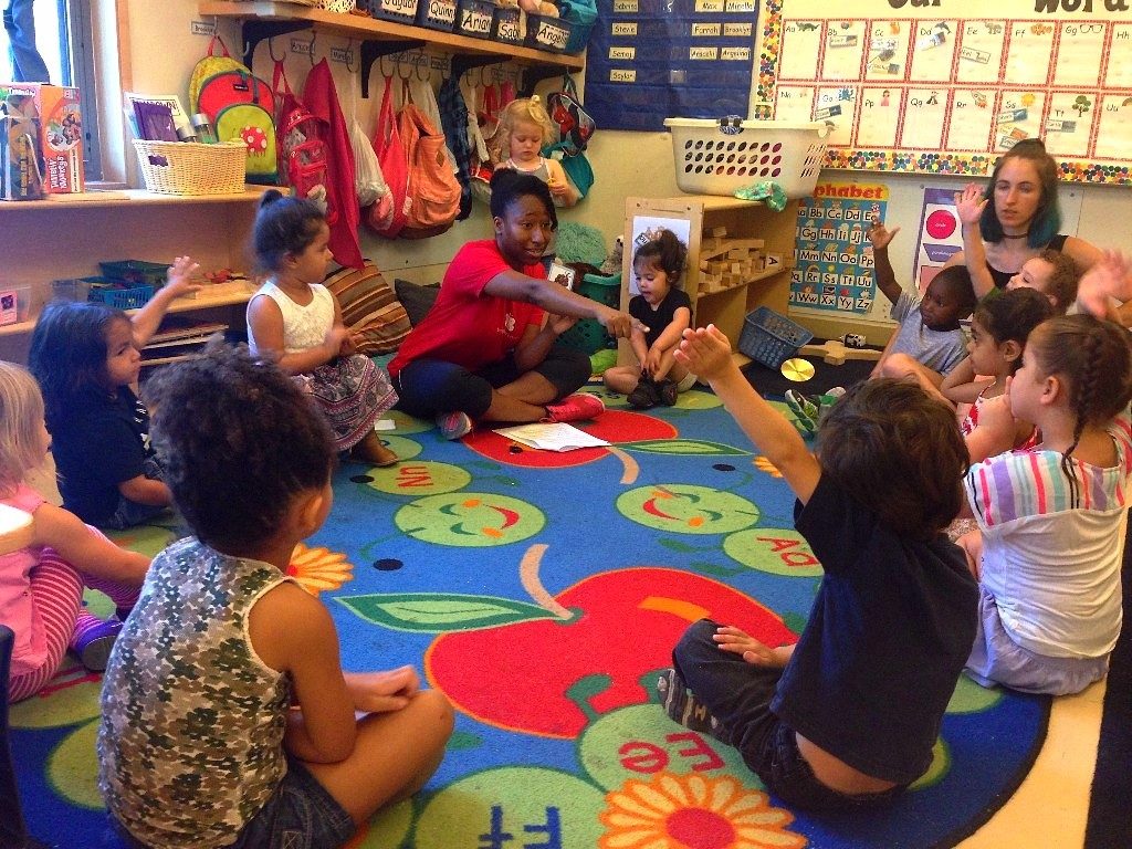 Program Associate Christina JeanBaptiste leading a CATCH lesson with a Kindergarten class at Mainspring School.